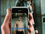 iPhone Nude App that uses Augmented Reality Algorithams to  turn a dressed boy into nude